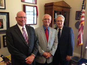 POAM Legislative Director Kenneth Grabowski, and US Representative Kerry Bentivolio POAM Legislative Director Kenneth Grabowski (left), US Representative Kerry Bentivolio (center) and POAM President Jim Tignanelli (right).