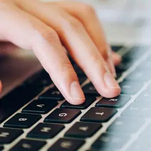Person using computer keyboard