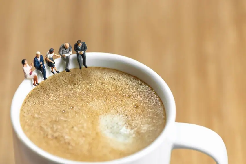 people chatting over coffee