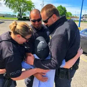 donut boy gets hugs from michigan police
