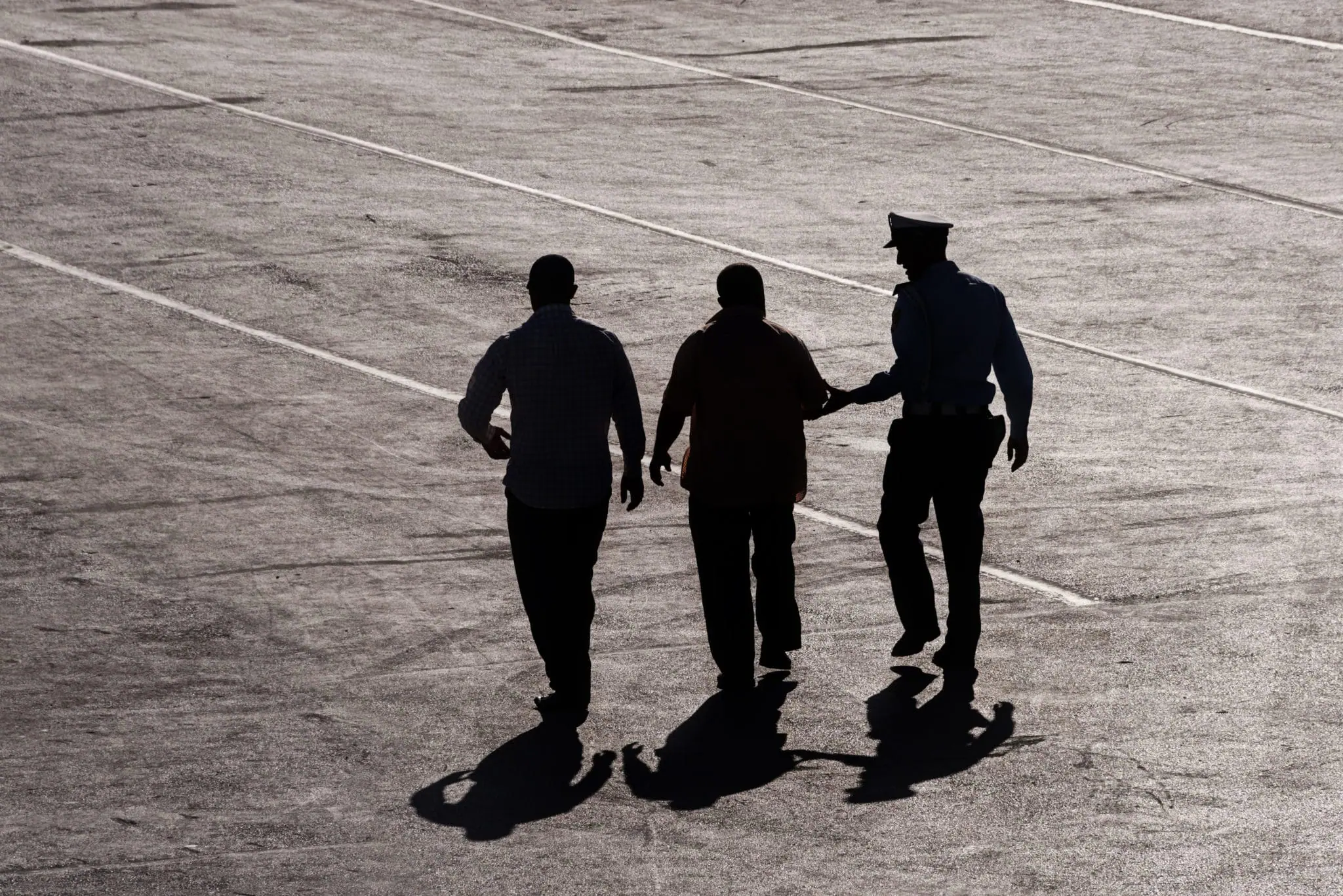 Three police officers walking | Novi Police Officer posting on POAM | Public Safety Officer in Fraser, Michigan