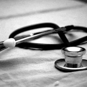 Medicare Buy In | Image of a stethoscope | MLC October Updates | Health Care Costs