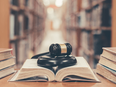 Direct Representation For Nonmembers | Union Operation Procedure | Gravel on top of an open book in a library. | Extended Legal Representation Plan