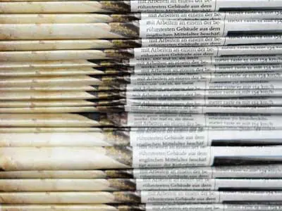 Stack of two sets of newspapers | COVID-19 News Coverage