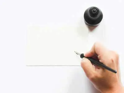 Hand holding pen near white paper and an ink well | Task Force Appointment | POAM President's Thoughts | MLC September Updates