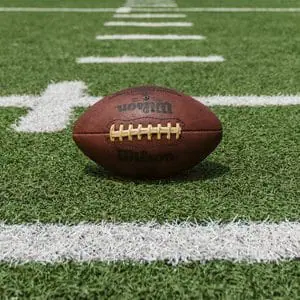 A football on a football field | Protecting our Officers