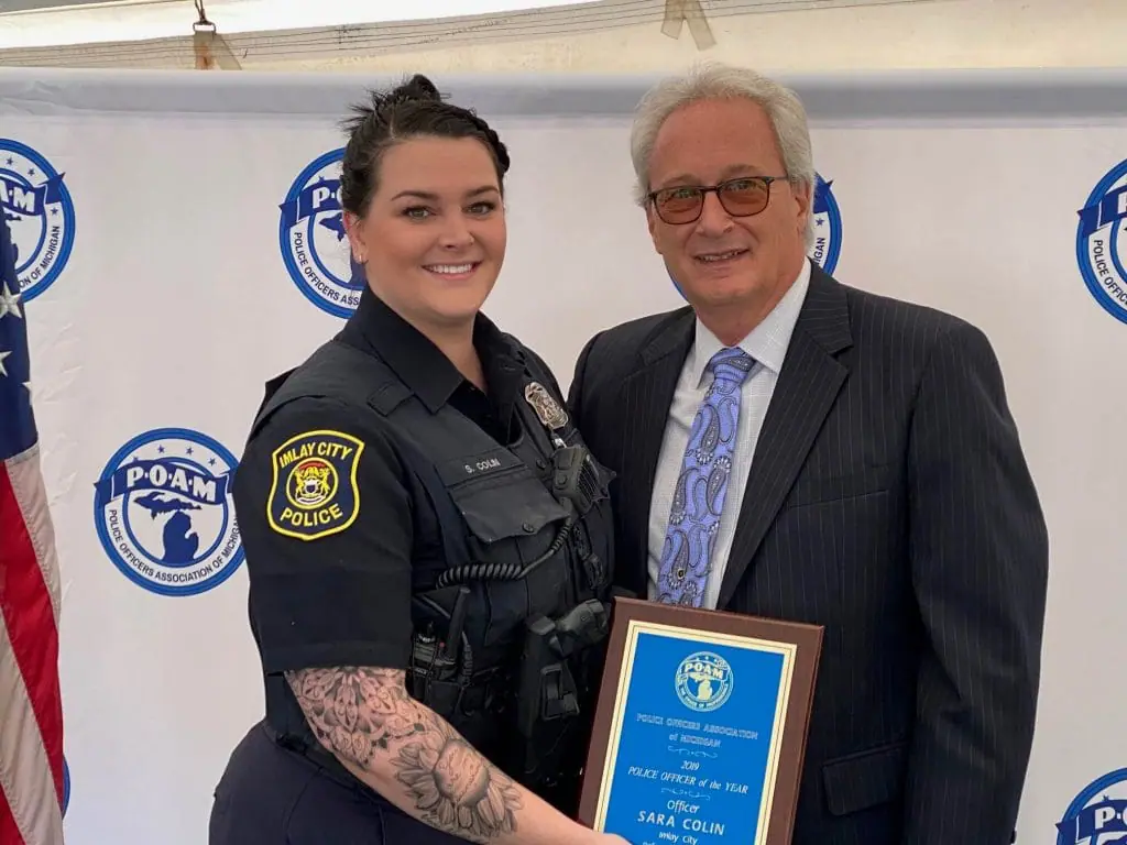 Officer Colin and President Tignanelli