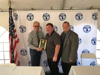 POAM President Jim Tignanelli, Officer Wilburn, and Business Agent Tom Scherer | Police Officer of the Year Recipient