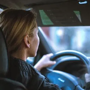 Teen sitting behind the steering wheel in a car | Traffic Stop Guidelines