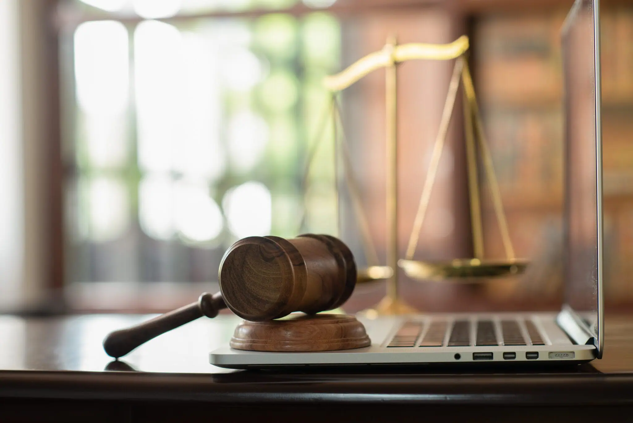 Court gavel laying on a laptop | Police Supplemental Appropriations Bill on POAM