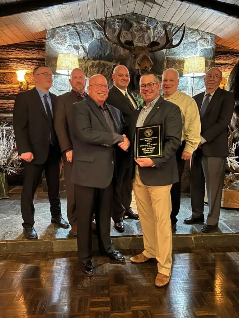 POAM Legislative Award State Rep Mike Mueller Michigan State Representative Mike Mueller presented with the 2022 Legislator of the Year Award from POAM