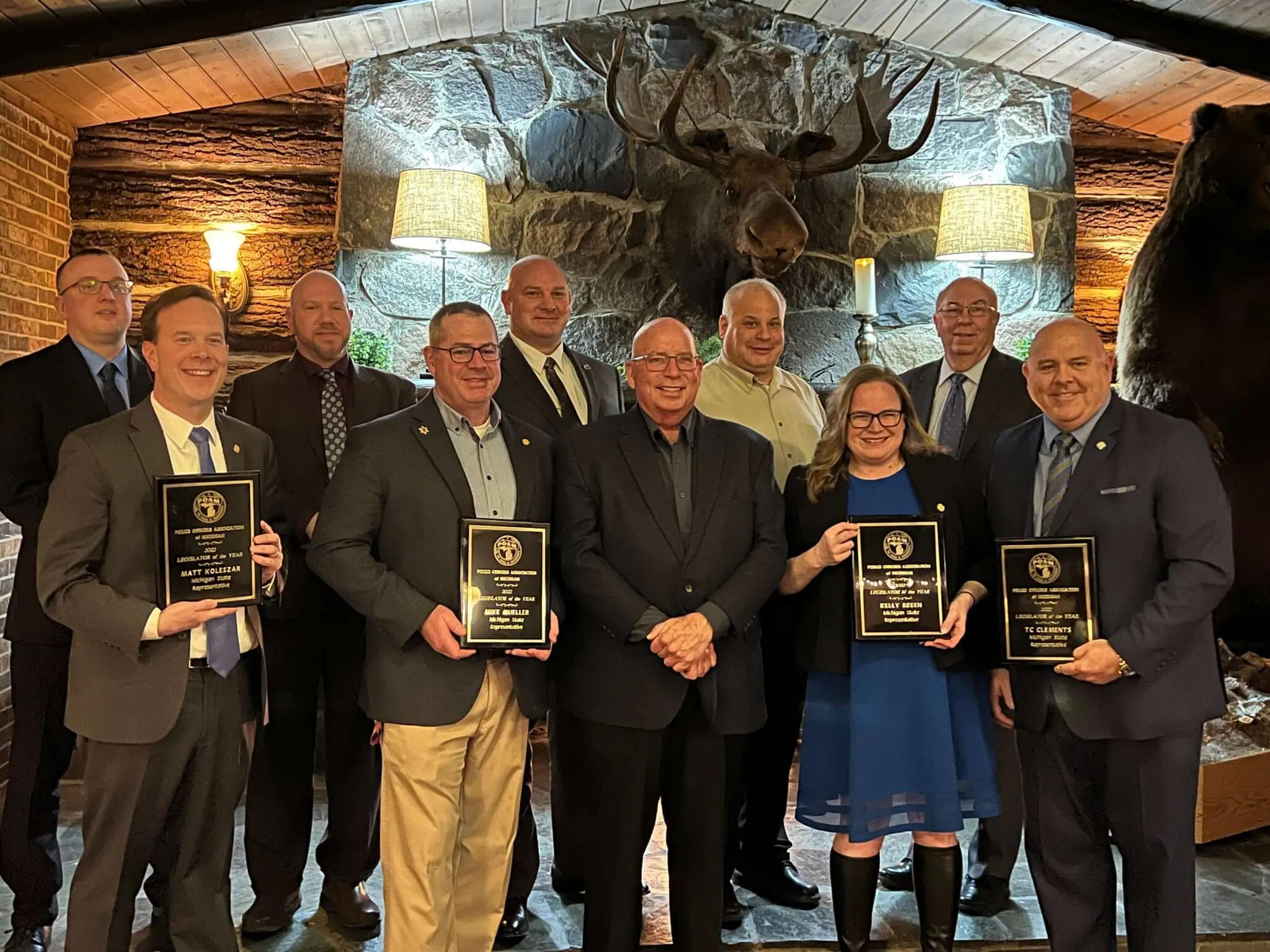 Group of Michigan State Representatives presented with the 2022 Legislator of the Year Award from POAM