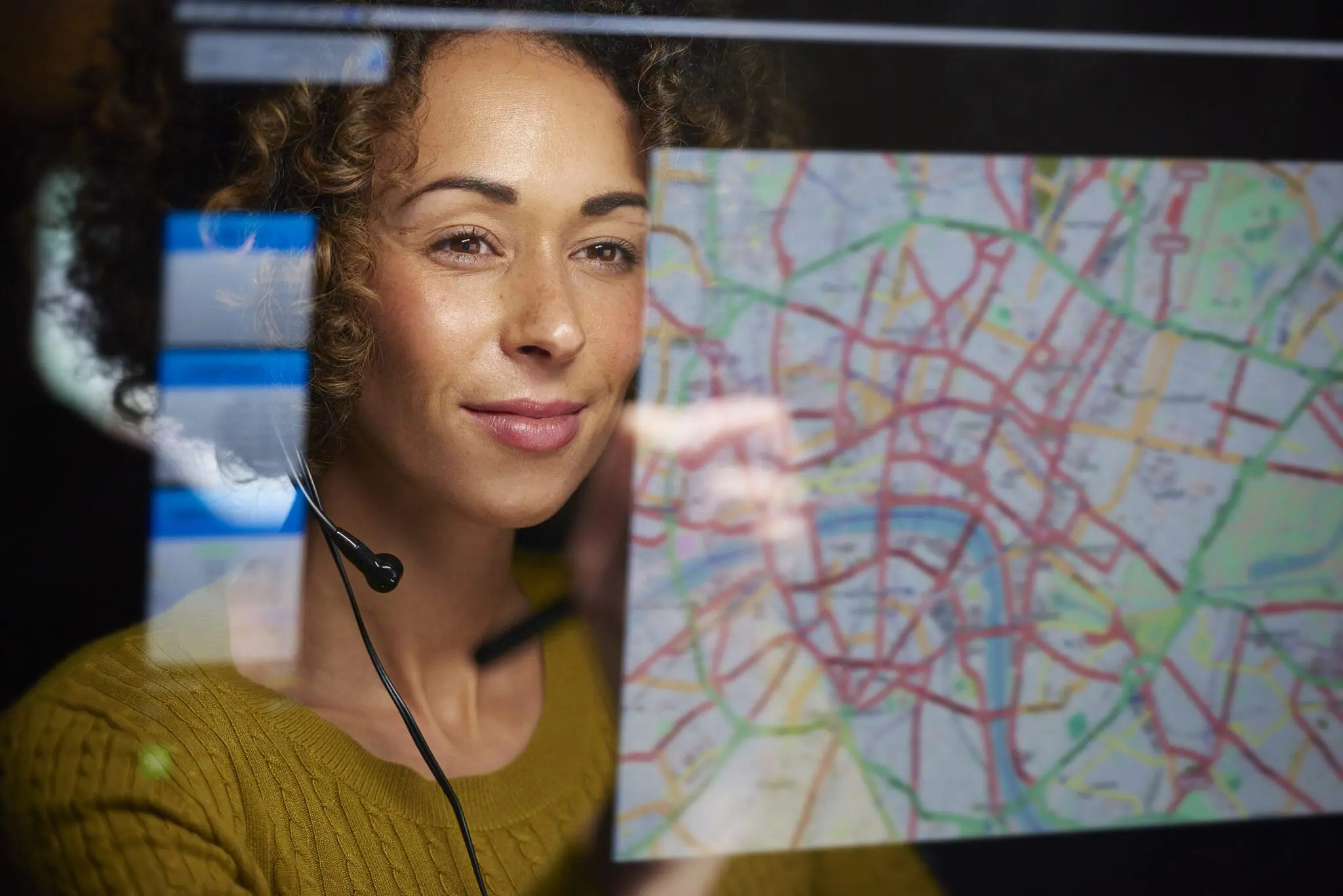 Dispatcher staring a map on a screen | Frontline Strong Specialist | POAM