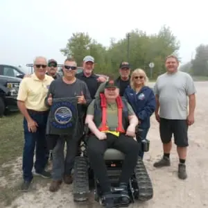 POAM-Defender-Mobility-Chris-Giles Group of POAM, Defender Mobility, and the family & friends of veteran Chris Giles who received a TracFab chair donation.