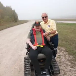 POAM-Defender-Mobility-Chris-Giles-Tignanelli POAM & Defender Mobility's Jim Tignanelli and veteran Chris Giles who received a TracFab chair donation.