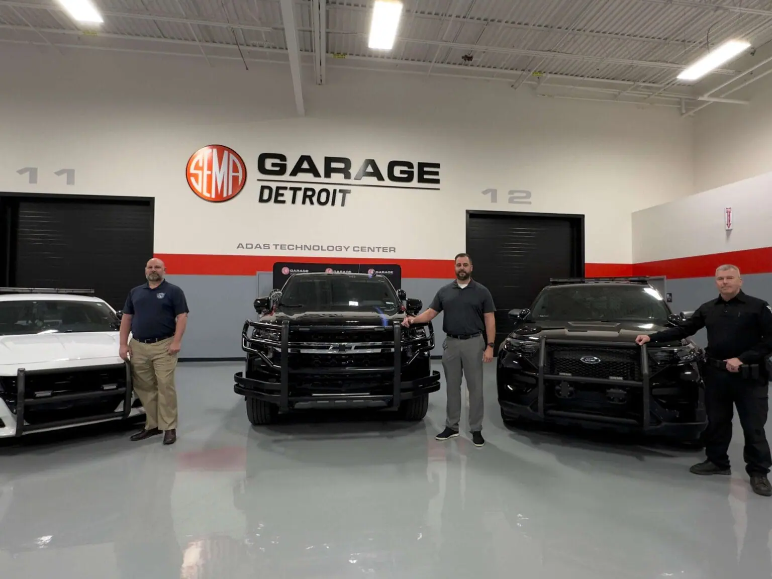 POAM-SEMA-Three-Officers SEMA Garage Detroit Livonia Police Vehicle