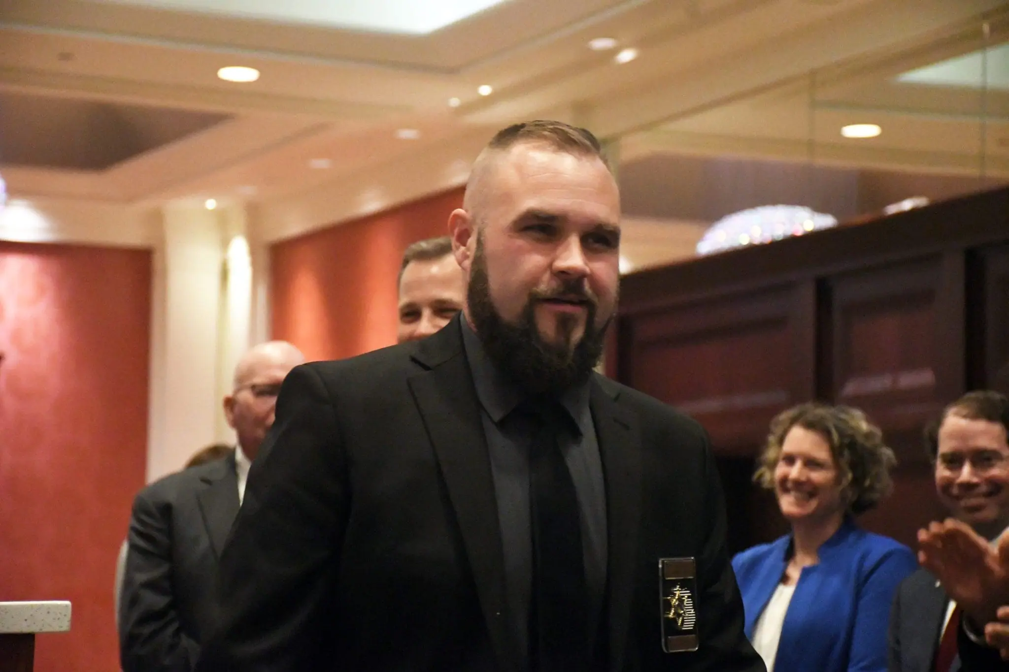Oscoda County Deputy Ryan Blair receiving the 2025 POAM Police Officer of the Year Award.