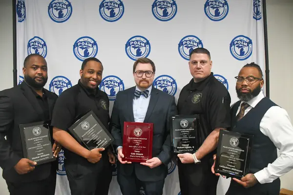 Wayne County Deputy Sheriff's Association Deputies Creceiving the 2025 Police Officer of the Year Award and the Distinguished Service Award at the POAM Annual Convention.