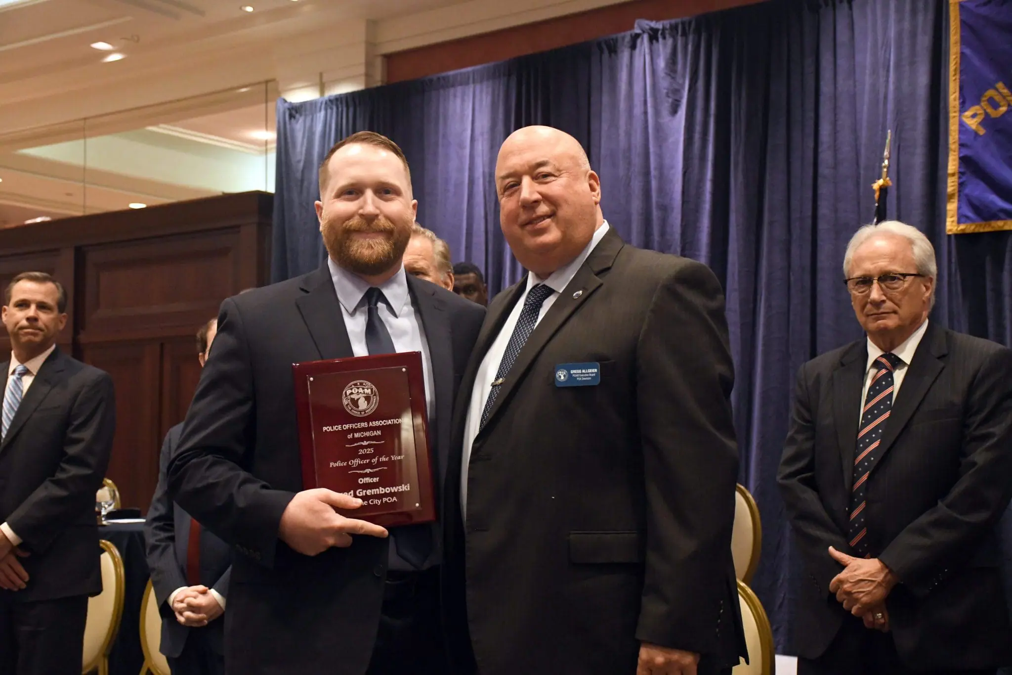 Wayne City POA Officer Jared Grembowski receiving the POAM 2025 Police Officer of the Year Award