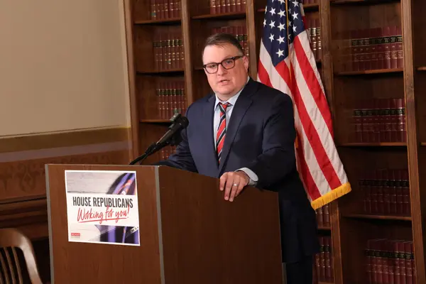 Michigan House Speaker Matt Hall (R-Richland Twp.) during a April 15, 2025 press conference standing at podium.